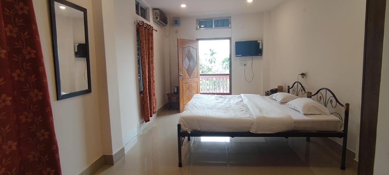 Hilltop Lodge Guwahati Rum bild